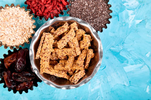Preview: Various superfoods in small bowl near granola