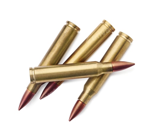 Preview: Many bullets on white background, top view. Military ammunition