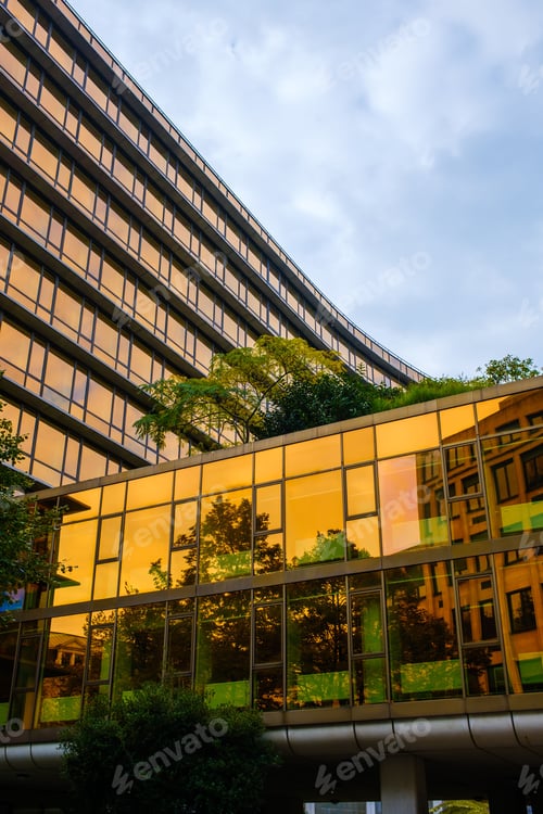 Preview: Office building with orange tinted windows in center of Brussels.