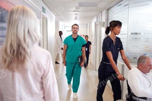 Preview: Busy Hospital Corridor With Medical Staff And Patients