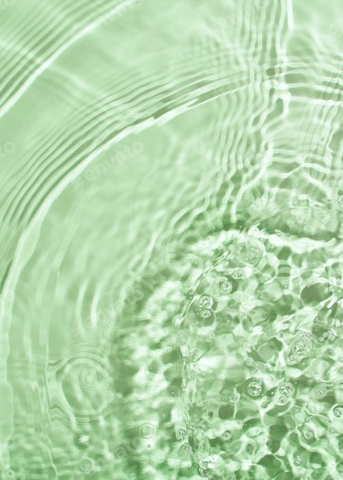 Preview: Transparent and clean green water background with sunlight reflection