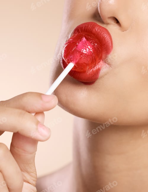 Preview: Lips, lipstick and lollipop, makeup and woman with face closeup in cosmetics advertising with studi