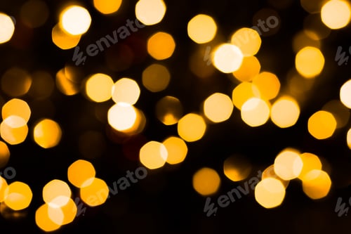 Preview: Gold defocused lights bokeh with dark background