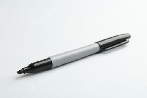 Preview: One black marker on light background. Space for text
