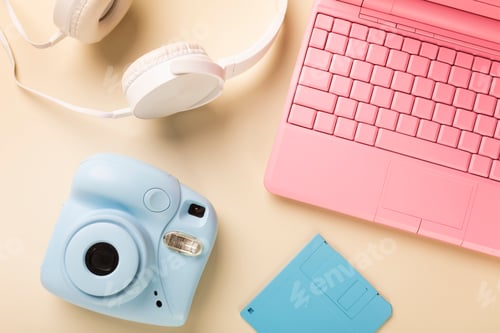 Preview: camera laptop headphones and floppy diskette in bright colors.