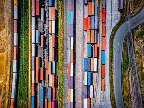 Preview: Top view of colorful freight trains on the railway station