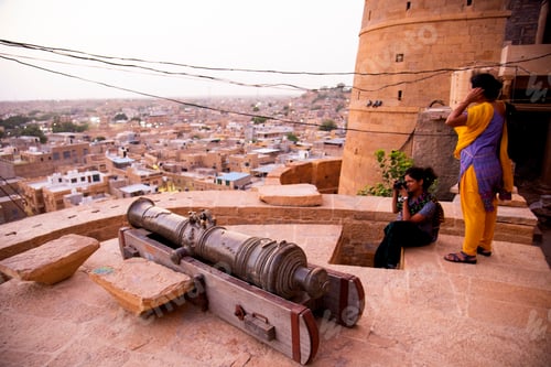Preview: Woman tourist at golden fort Jaisalmer, India.