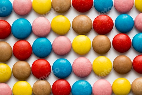 Preview: Close up of a pile of colorful chocolate coated candy, chocolate pattern, chocolate background