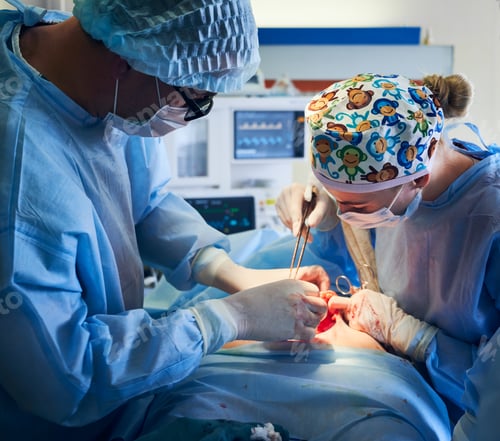 Preview: Medical team doing abdominoplasty or tummy tuck surgery in clinic.