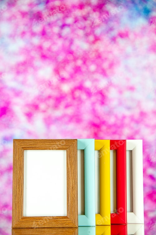 Preview: front view different picture frames with colored corners on light pink background color picture