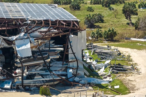 Preview: Hurricane Ian destroyed boat station in Florida coastal area. Natural disaster and its consequences
