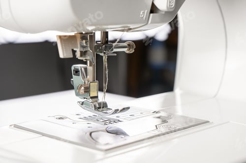 Preview: Modern White Sewing Machine Presser Foot Closeup, Macro