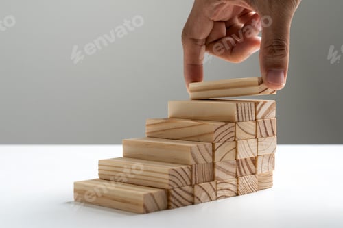 Preview: Hand arranging wood block stacking as step stair