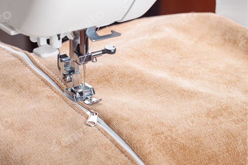 Preview: Modern Sewing Machine Special Presser Foot With Beige Fabric And Zipper, Closeup