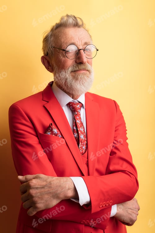 Preview: Successful fashion designer dressed in luxury stylish red suit with neck tie