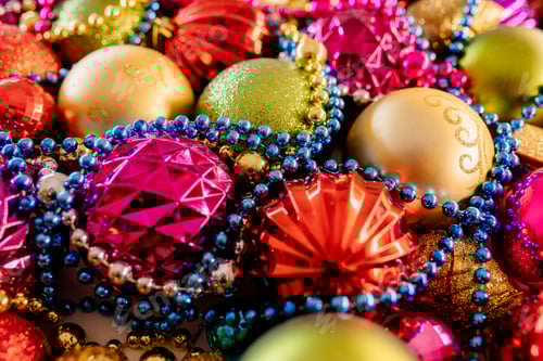 Preview: top view of many Colorful christmas balls on table.