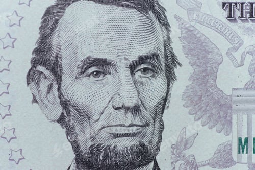 Preview: US President Abraham Lincoln face on five dollar bill macro, 5 u