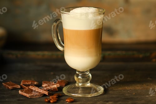 Preview: Latte - A Cup Of Coffee With Milk In A Transparent Cup On The Table. Top View.