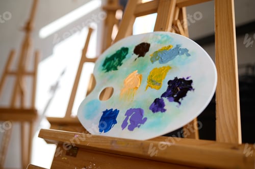 Preview: Colorful Paints on Palette with Wooden Easel