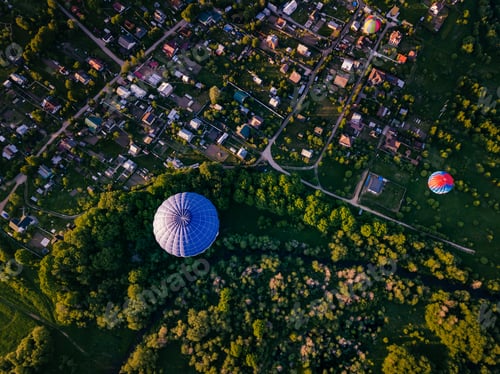 Preview: Hot air balloons. Aerial view hot air balloons flying over summer countryside