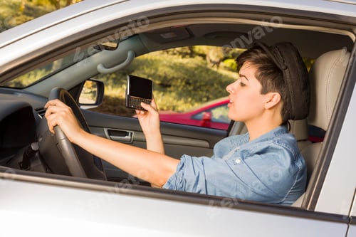 Preview: Mixed Race Woman Texting and Driving