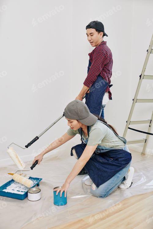 Preview: Couple painting bedroom walls