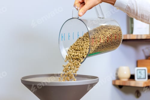 Preview: Process of roasting raw coffee beans in an oven, a pouring raw coffee beans