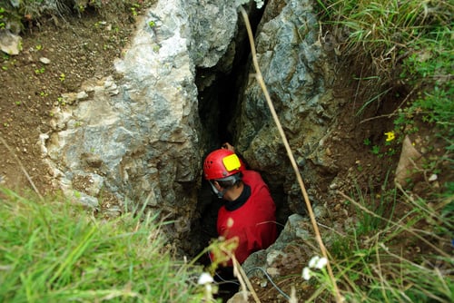 Preview: Caver descends in a cave