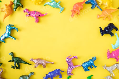Preview: Various animal toy figures in a colorful background and a copyspace