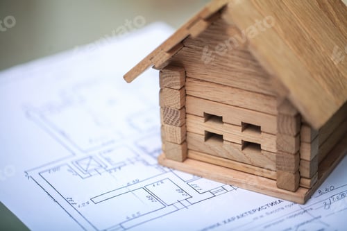 Preview: Building house on blueprints with plan - construction project