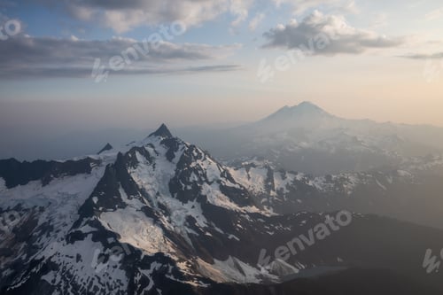 Preview: Aerial landscape view of the rugged mountain peaks with Mount Baker in the background