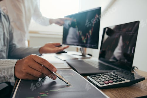 Preview: investors are working together with analyzing the stock data graphs