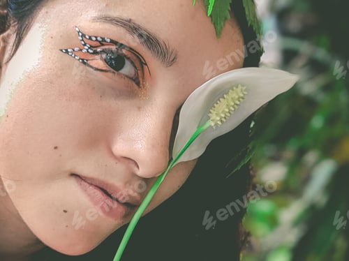 Preview: Vertical closeup shot of a female face