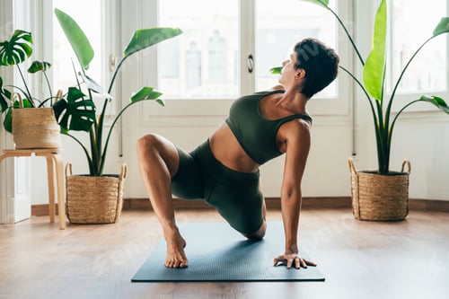 Preview: Beautiful sporty girl making yoga training