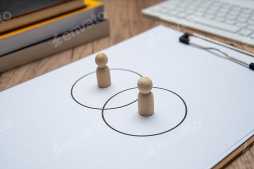 Preview: Two wooden figures standing in separate circles overlaps with each other.