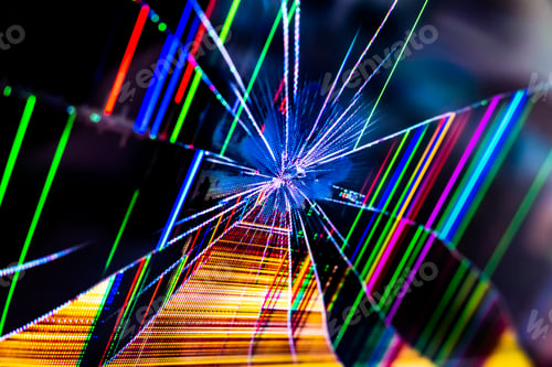 Preview: Abstract background composed of a broken glass of a television with detail of colorful pixels.