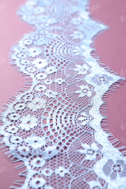 Preview: White lace on purple background, closeup view