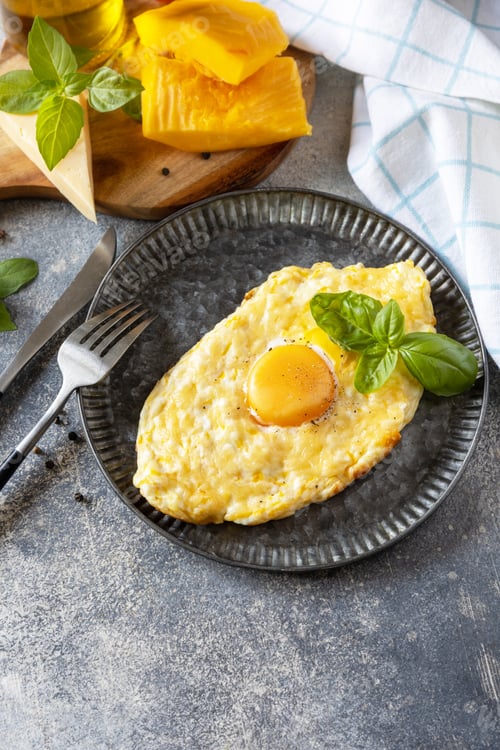 Preview: Baked cottage cheese pumpkin bread with cheese and egg filling on stone background.