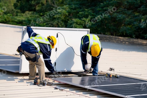 Preview: workers installing solar panels, for efficient energy on rooftop