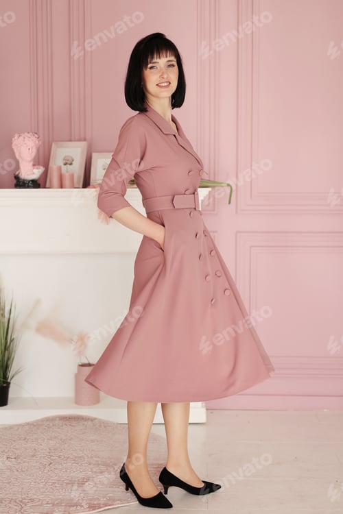 Preview: Portrait of attractive smiling brunette with short hair woman folded arms staying alone at stylish
