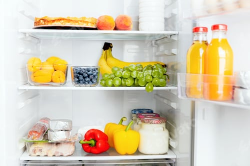 Preview: Open fridge or refrigerator door filled with fresh fruits, vegetables, juice