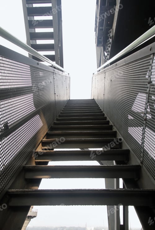 Preview: Low angle vertical shot of a of a staircase going up