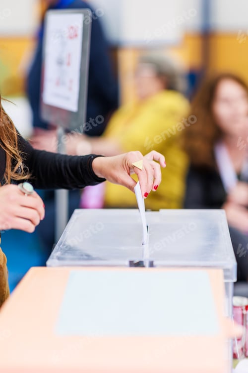 Preview: voting democracy background. Unrecognizable hispanic woman hand in candidate election referendum