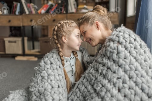 Preview: Affectionate Mother and Daughter Sharing a Tender Moment