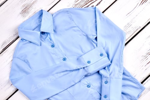 Preview: Light Blue Shirt on White Wood Background