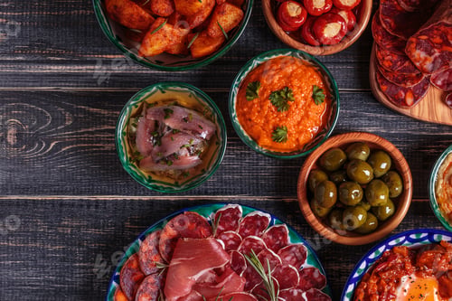 Preview: Typical spanish tapas concept, rustic style, top view.