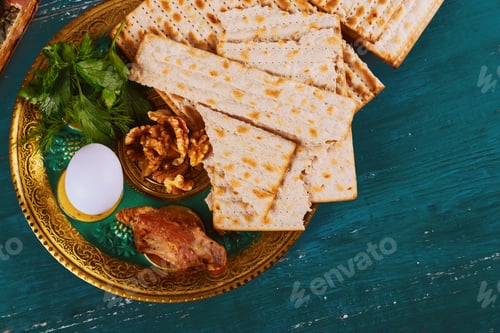 Preview: Passover matzoh jewish holiday bread over wooden table.