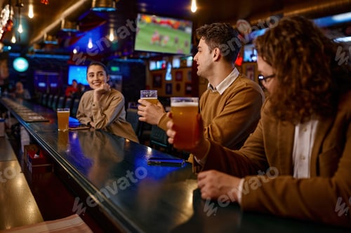 Preview: Young male friends flirting with woman at bar counter