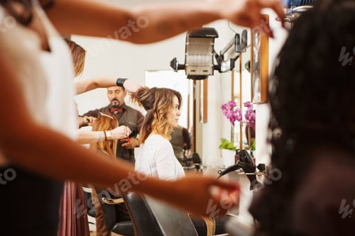 Preview: Stylish hair salon in full swing with clients and stylists at work