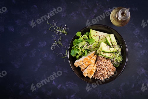 Preview: Lunch salad. Buddha bowl with buckwheat porridge, grilled chicken fillet, corn salad